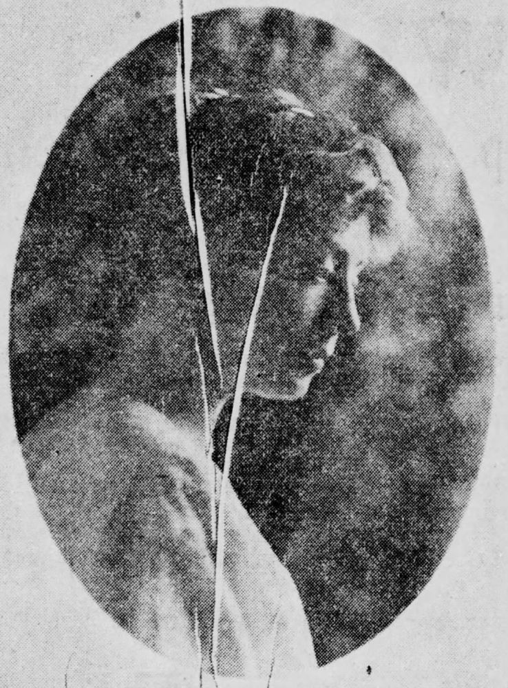 A scratched, grainy 1914 newspaper portrait of a young woman in profile, before restoration